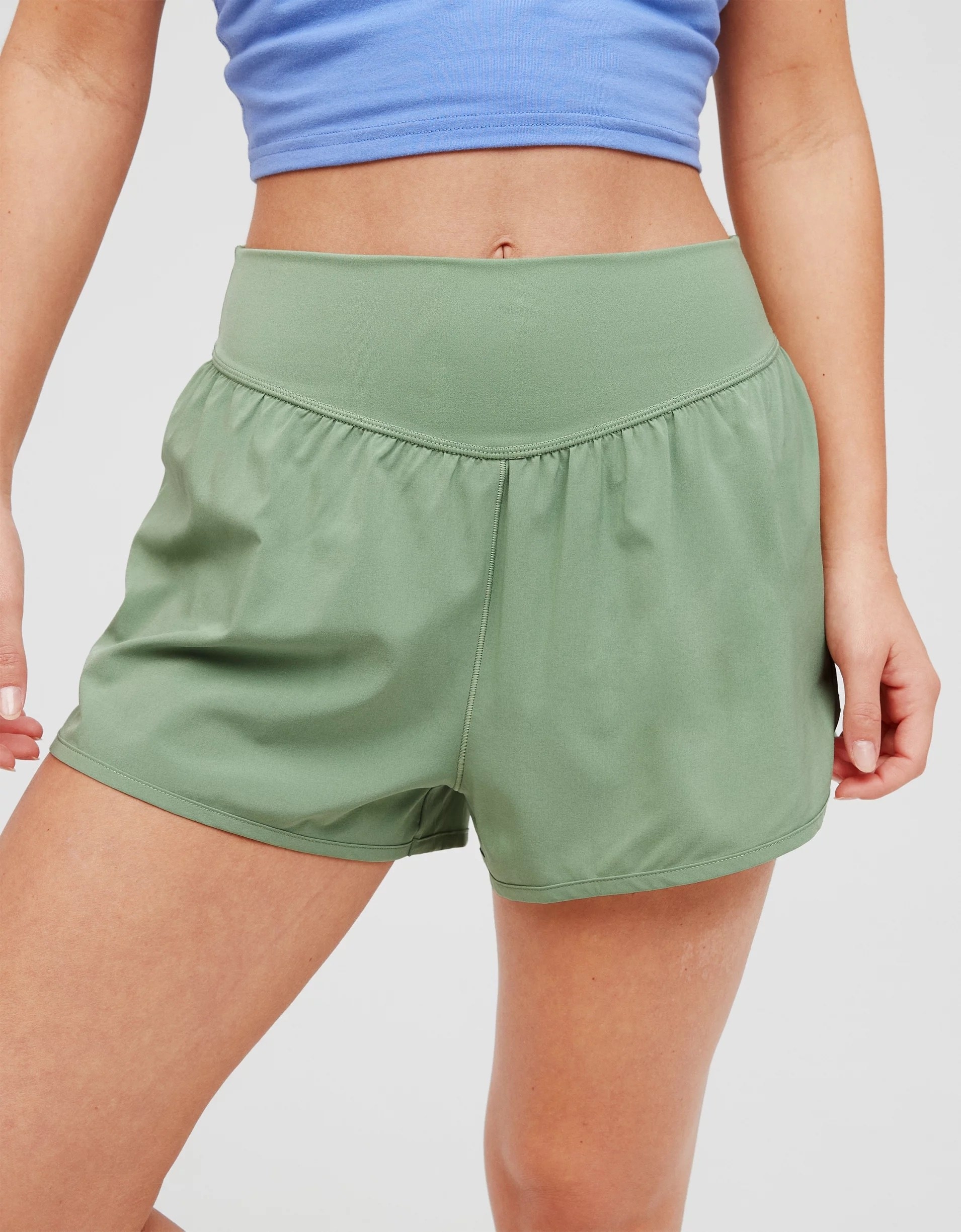 model wearing the shorts in green