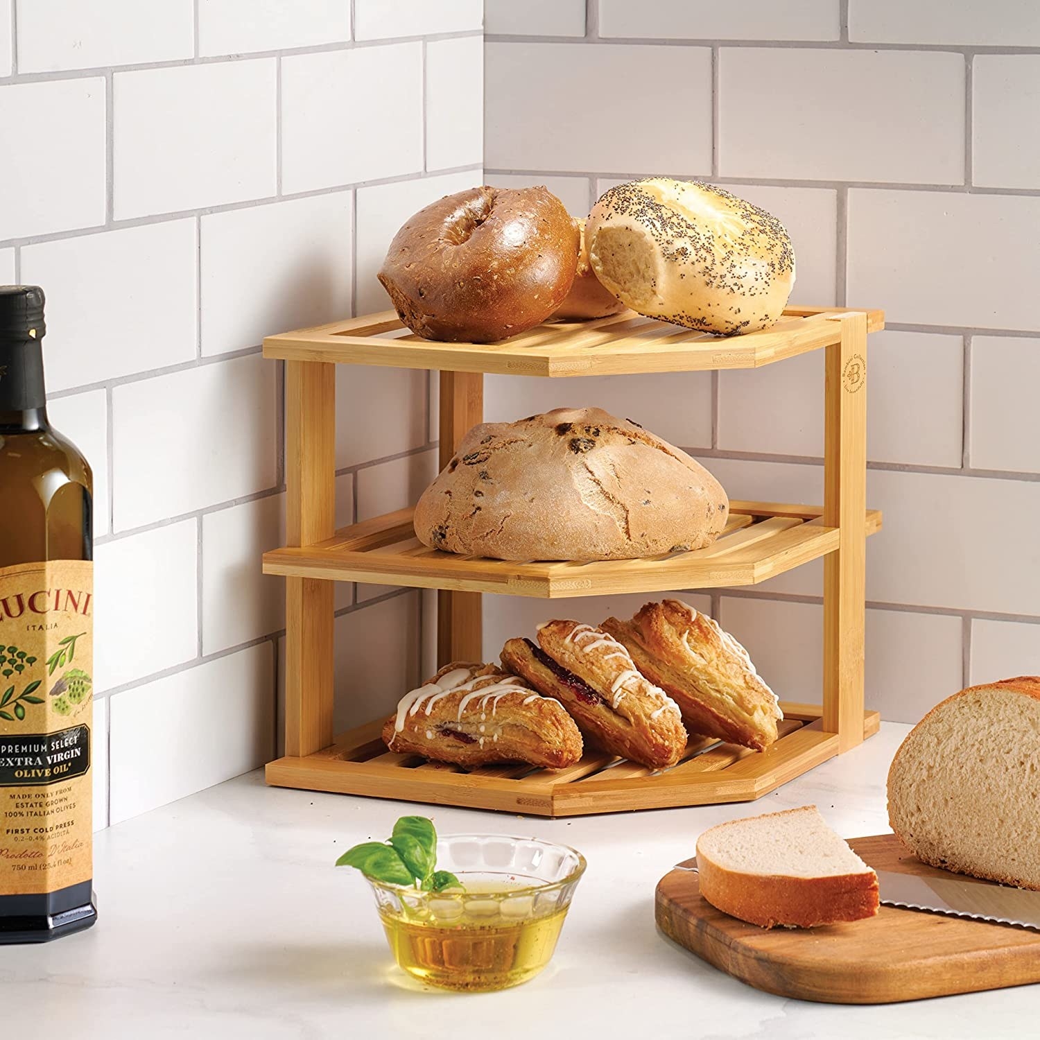 a bamboo corner shelf stacked high with breads and pastries