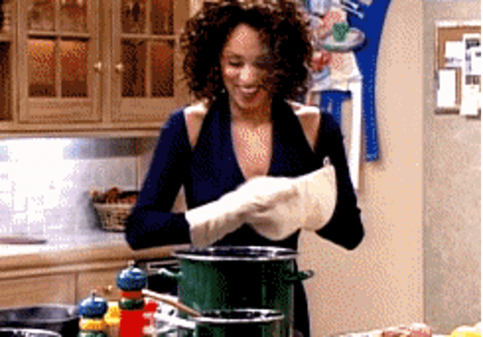 Karyn Parsons in &quot;The Fresh Prince of Bel-Air&quot; cooking with oven mitts on