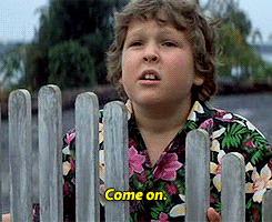 Jeff Cohen as Chunk in &quot;The Goonies,&quot; wearing a Hawaiian shirt and groaning at his friends