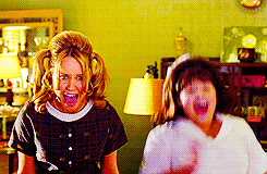Amanda Bynes and Nikki Blonsky dancing in front of the TV in &quot;Hairspray&quot;