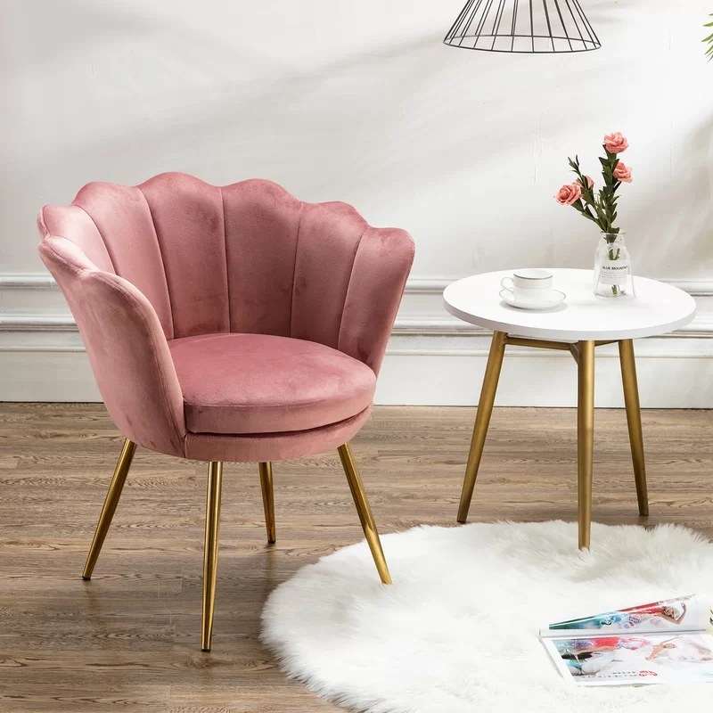 The chair in the color Pink with Gold legs
