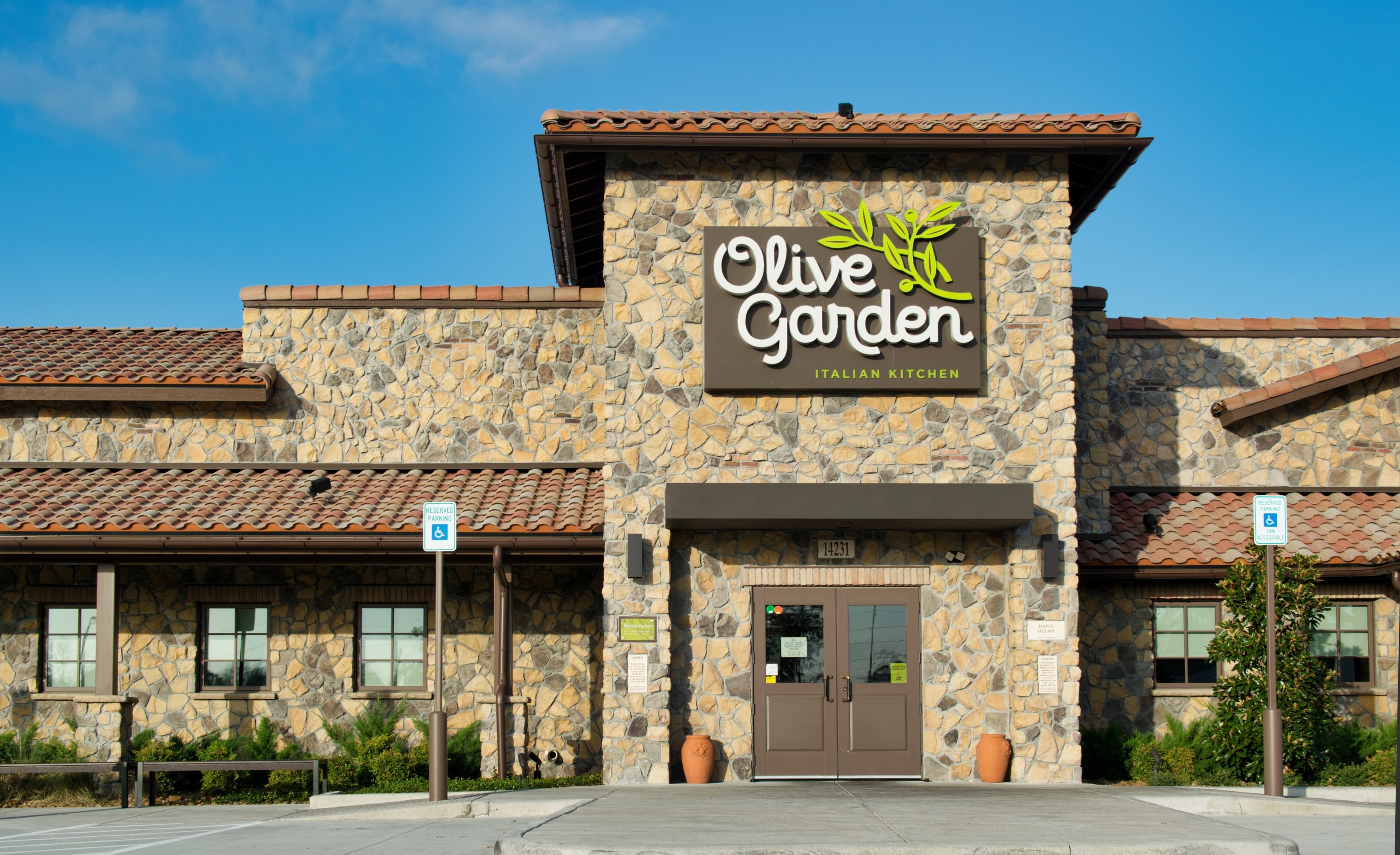 The exterior of an Olive Garden restaurant