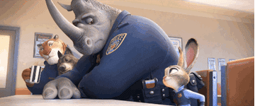 Judy requesting a fist-bump from a rhino cop who pushes her away with the fist-bump