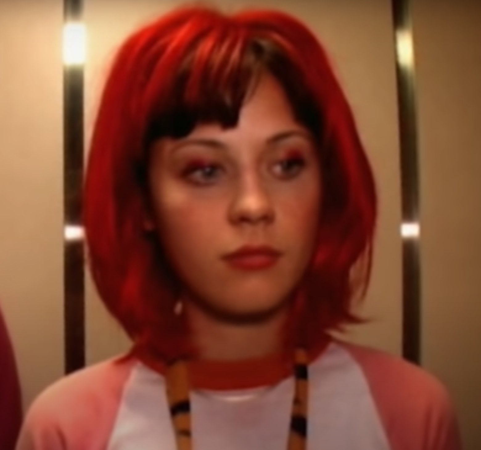 Zooey Deschanel stands in an elevator in the &quot;She&#x27;s Got Issues&quot; video