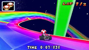 Toad driving on the Rainbow Road