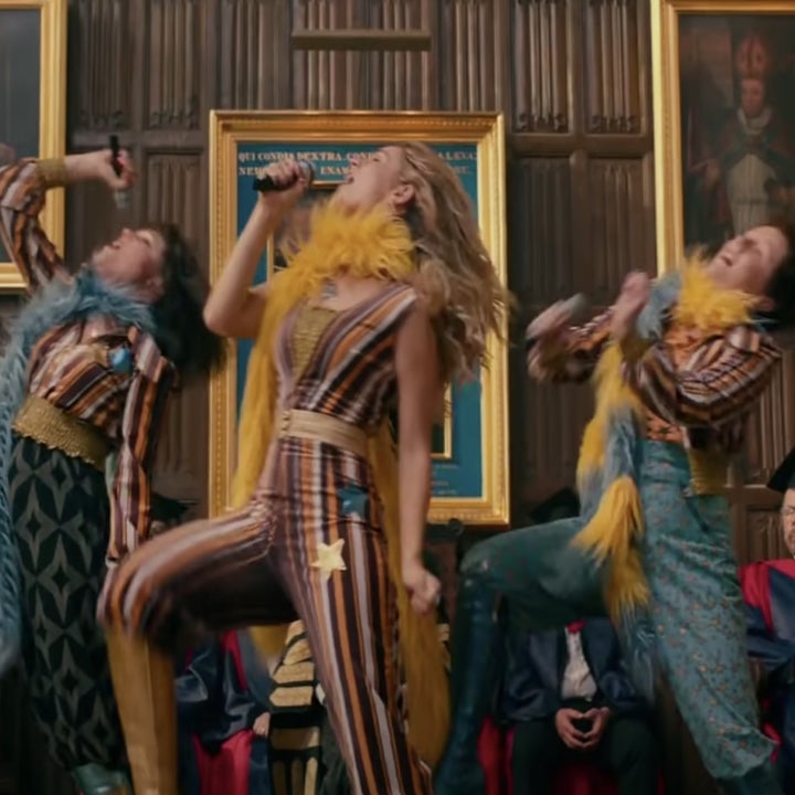 Donna and the Dynamos singing in outfits that all contain the same striped fabric