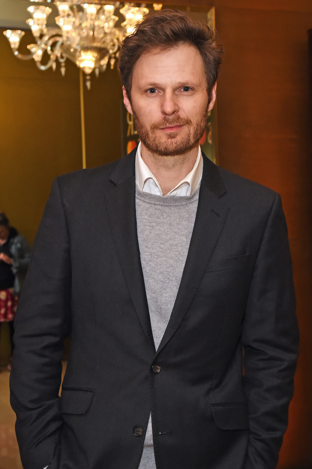 Rupert posing for a photo at an event