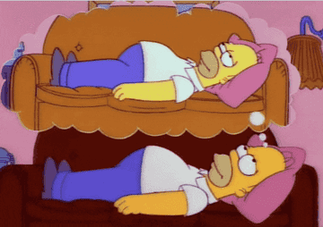 Gif of Homer Simpson laying on a couch daydreaming about himself lounging on another couch
