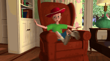 a cartoon character spinning around in a chair