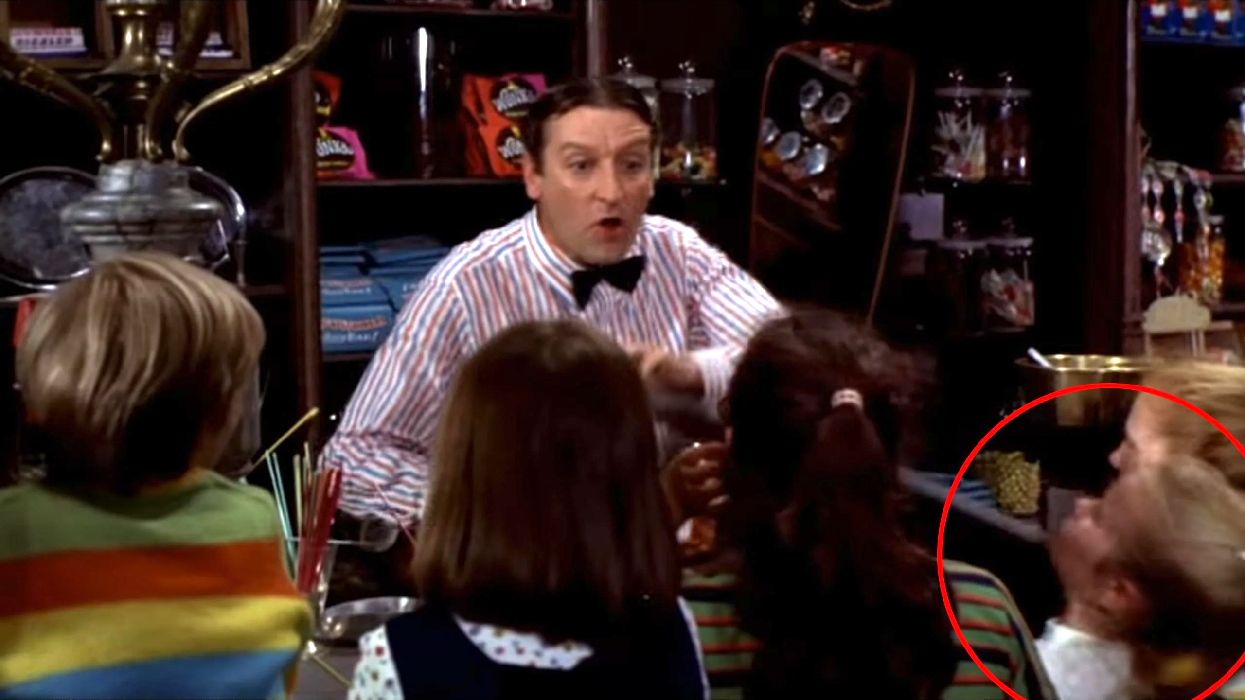 A girl lifting her chin as the counter is lifted up