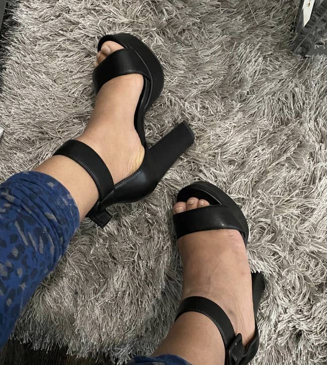 reviewer wearing the achromatic  heels