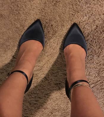 reviewer POV photo wearing the black heels