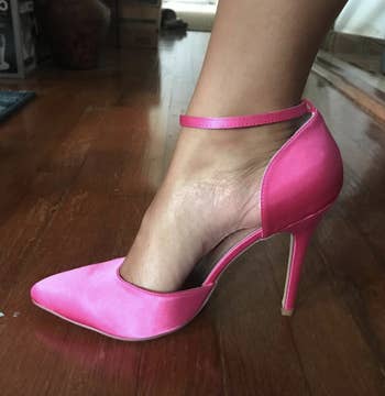 reviewer wearing the pink heels