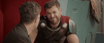 Chris Hemsworth as Thor in Thor: Ragnarok asking Mark Ruffalo as Bruce Banner &quot;Is it though?&quot;.