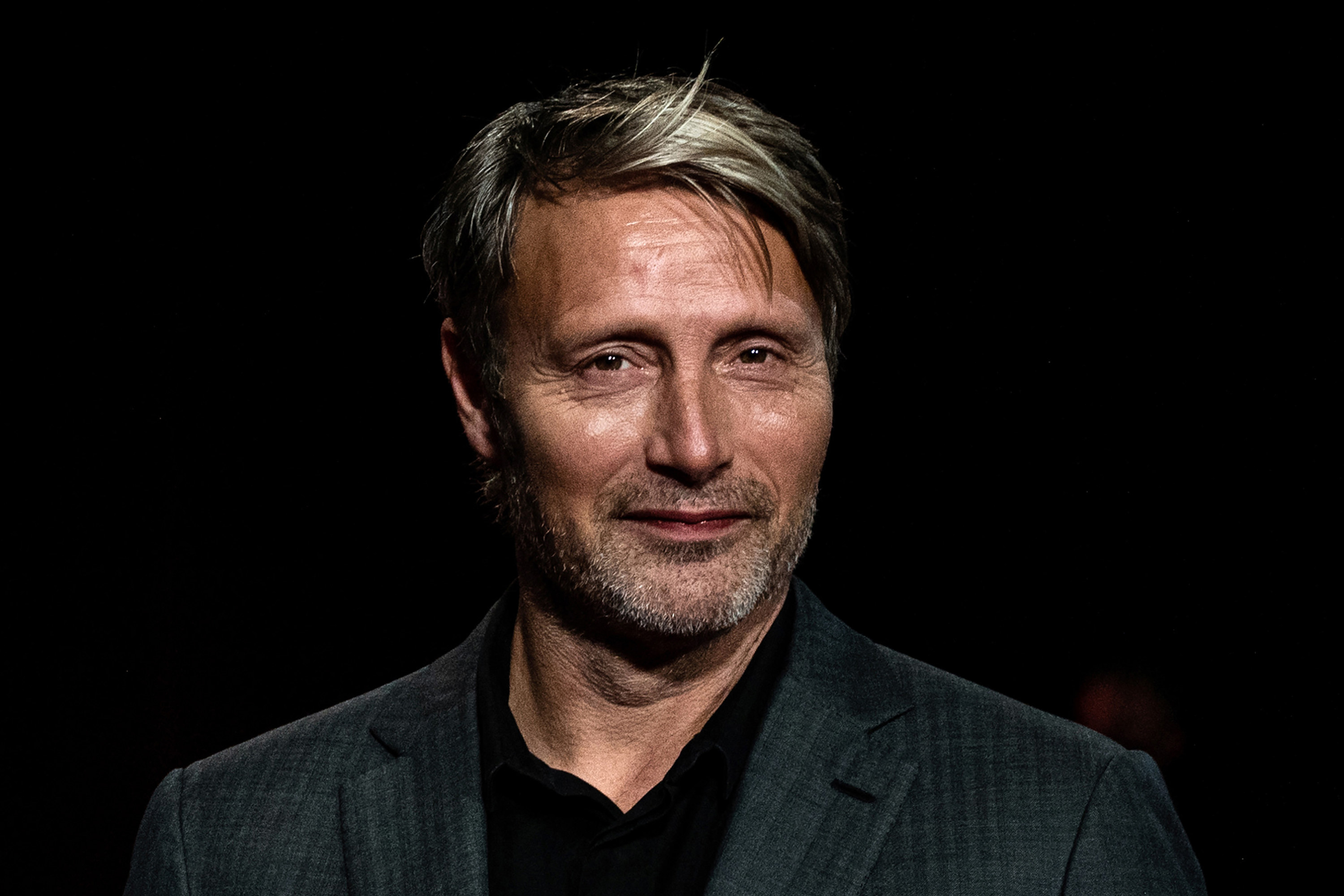 Mads smiles at an event