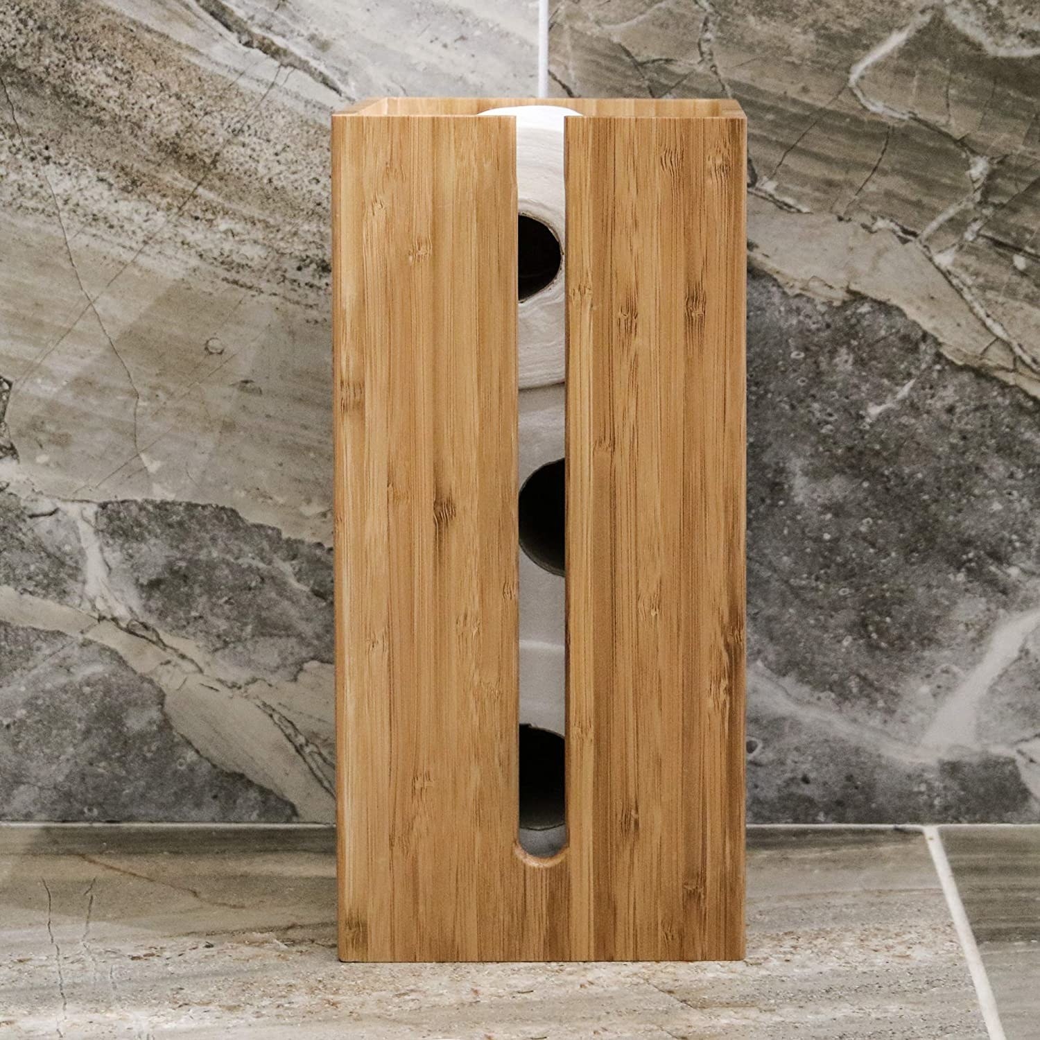 a bamboo toilet paper rack that hides the rolls inside