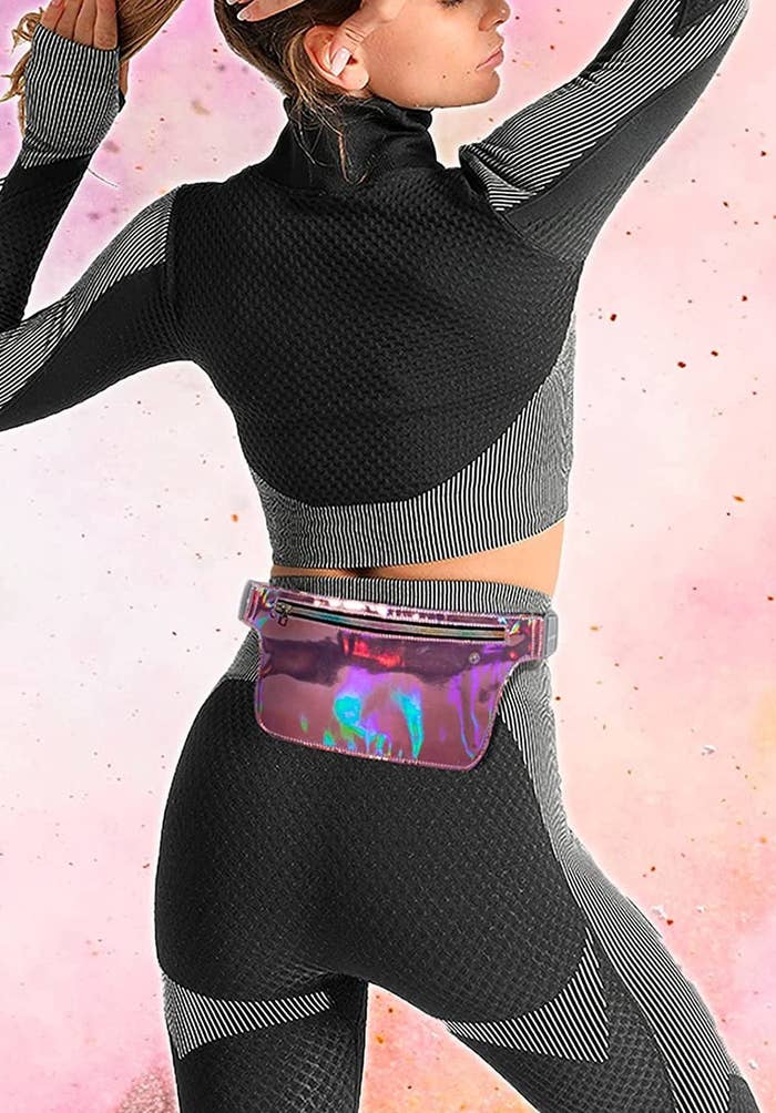 A person wearing the fanny pack on their waist, facing away from the camera