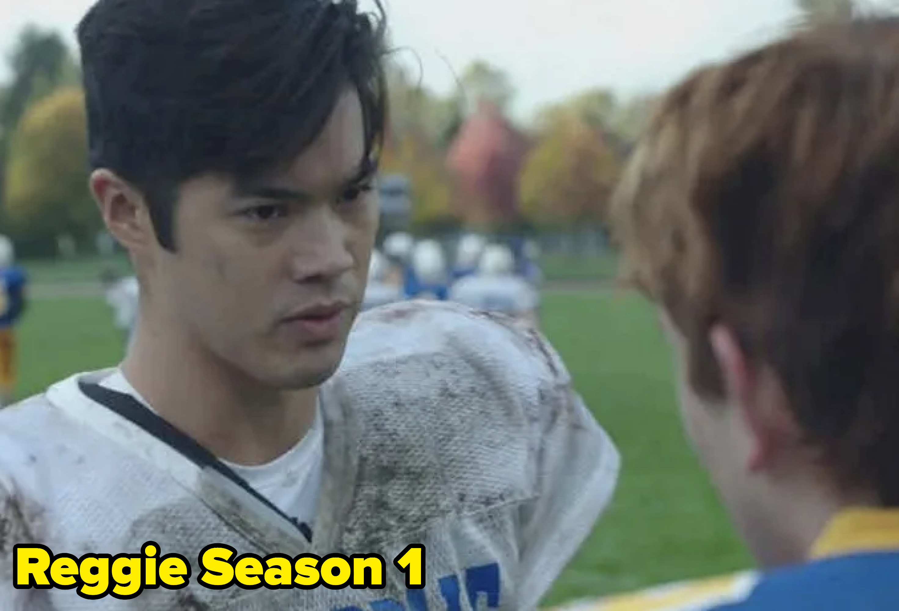 Reggie in a football uniform during a scene