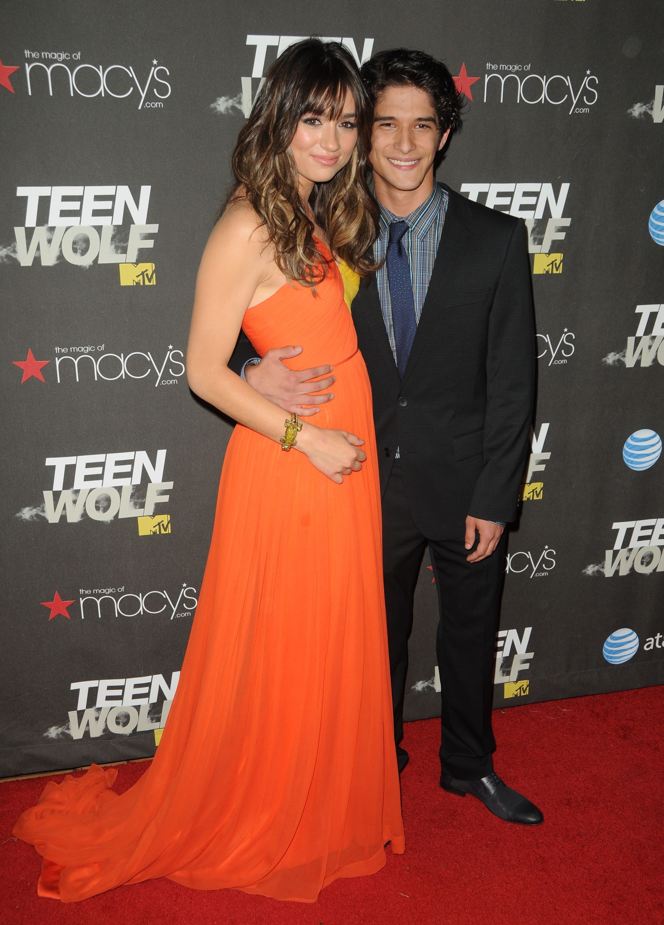 Crystal Reed and Tyler posing on the red carpet