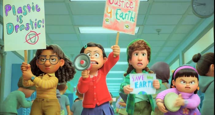 Mei Mei and her friends hold "Save the Earth" signs as they protest in their school