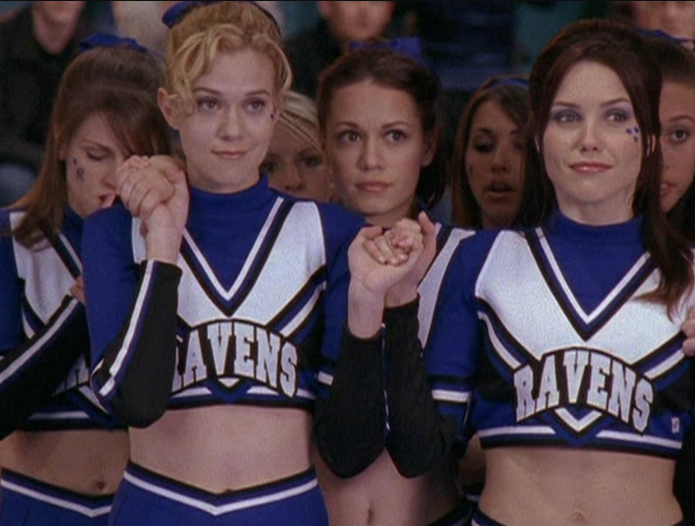 The three characters holding hands on One Tree Hill