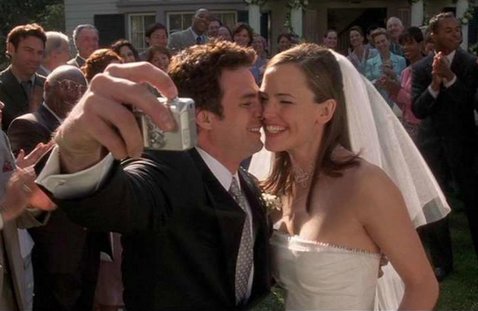 Matty and Jenna smiling at their wedding in 13 Going on 30