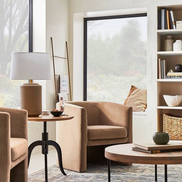A brown accent chair in a living room