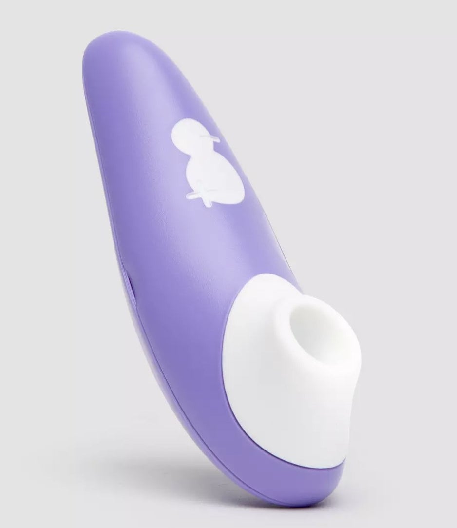 The purple suction toy with duck design on handle