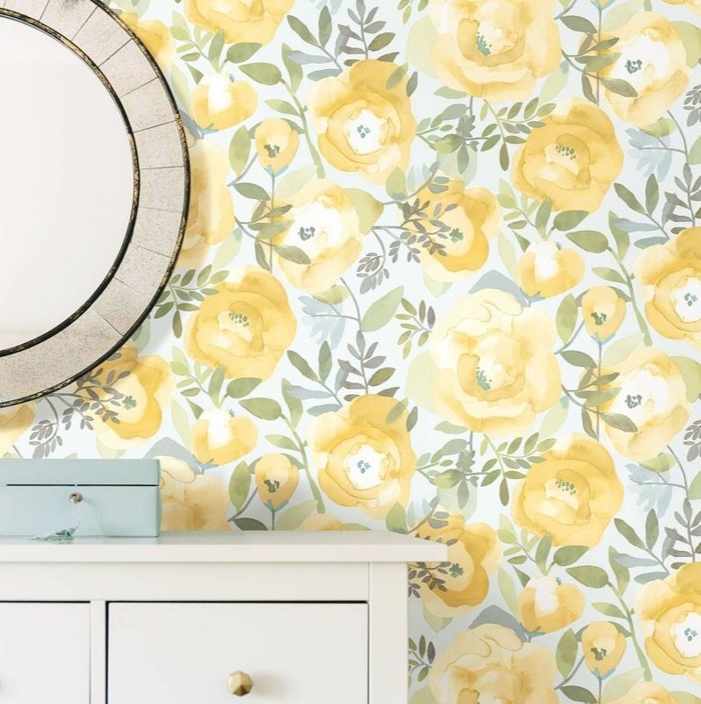 A yellow floral peel and stick wallpaper