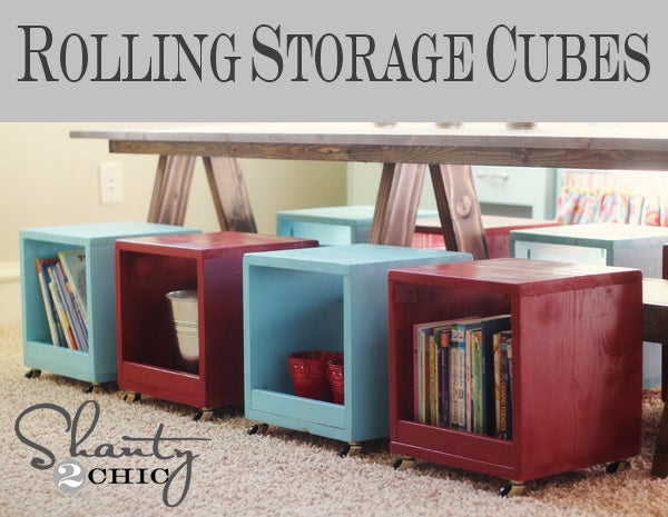 Blogger&#x27;s photo of the blue and red storage cubes with wheels holding books and other things
