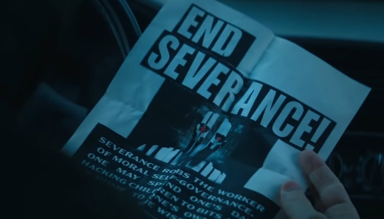 Mark holding an &quot;End Severance&quot; poster in &quot;Severance&quot;