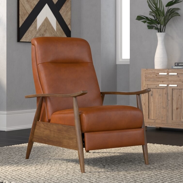 the clean classic faux leather recliner with wood details