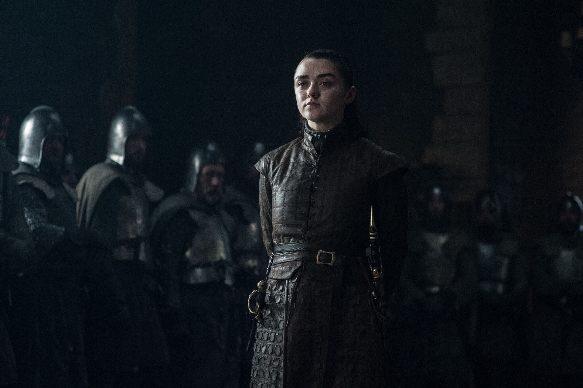 Arya stands in front of guards