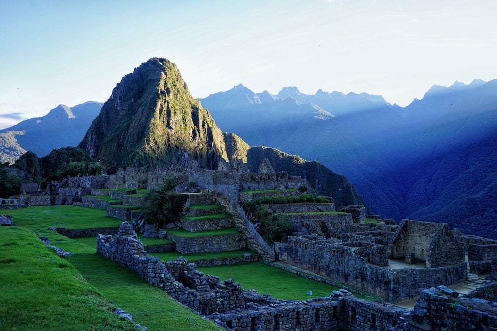 The sun rising over Machu Picchu.