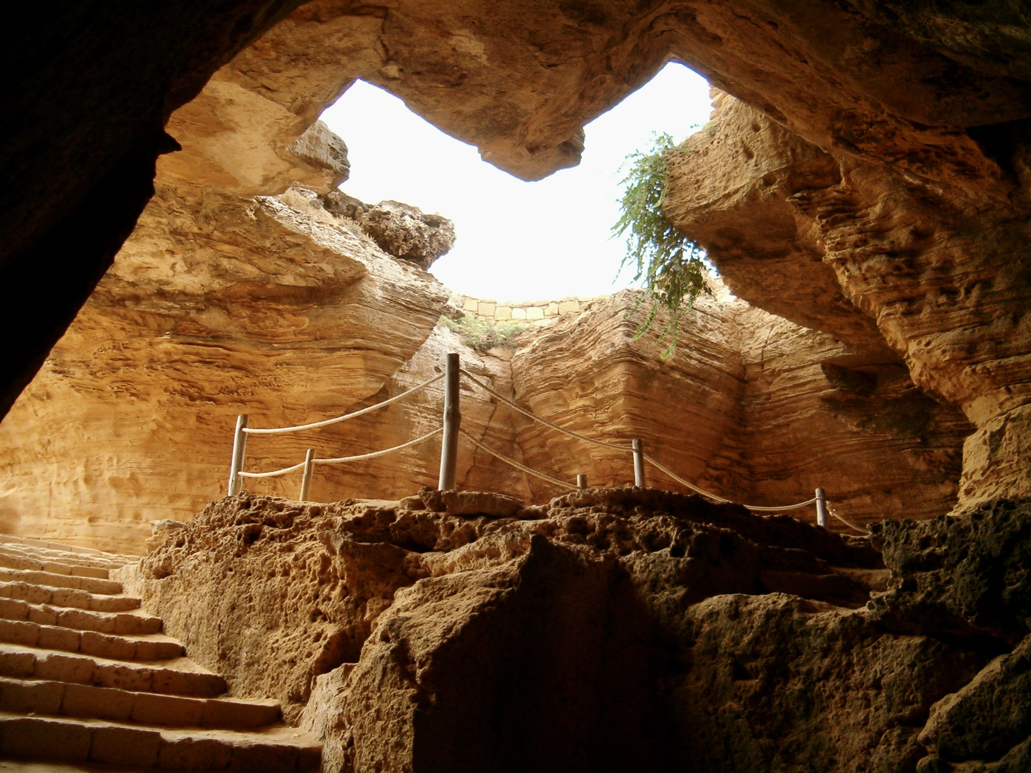 A cave with a heart-shaped entrance
