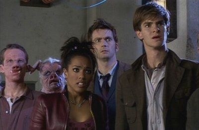 Andrew Garfield stands with the cast of Doctor Who