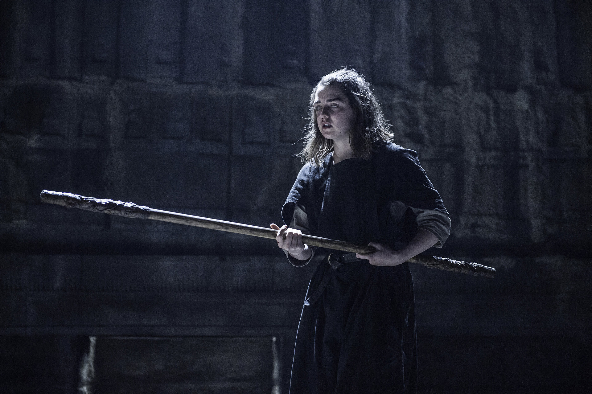 Arya holds a huge stick