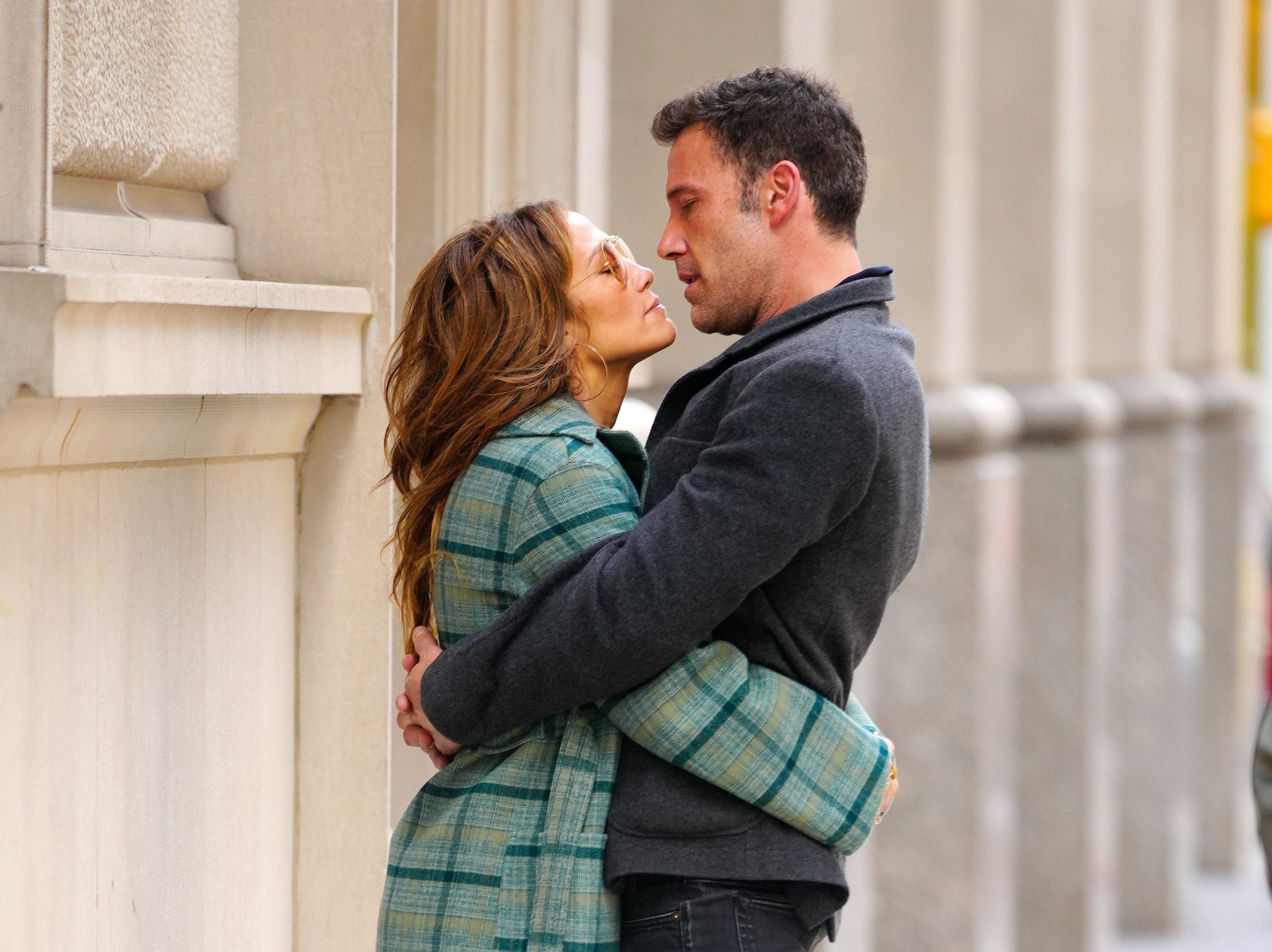 Jennifer and Ben embrace in the streets