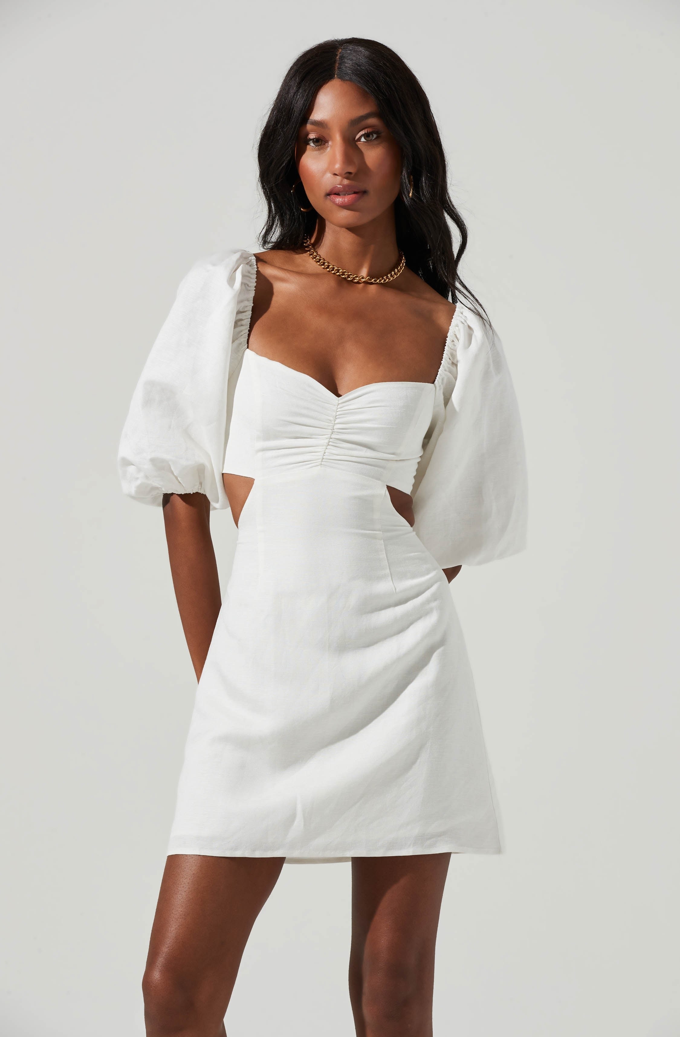 model wearing the white dress