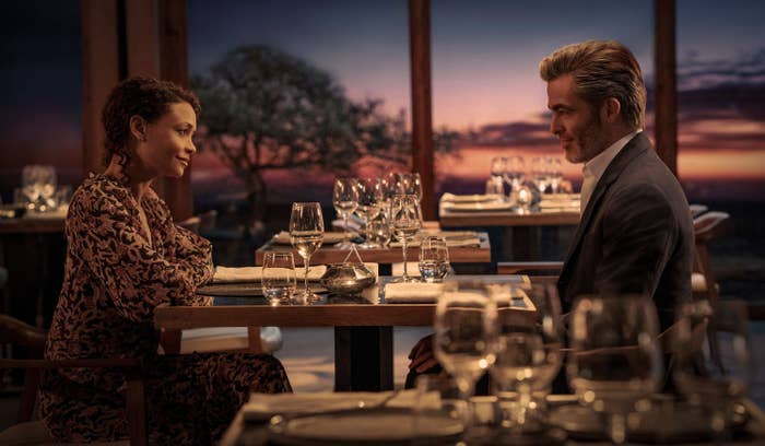 Thandiwe Newton and Chris Pine sit across each other for a dinner date