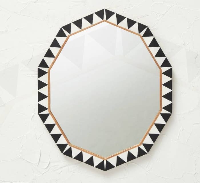 Geometric mirror with black and white frame