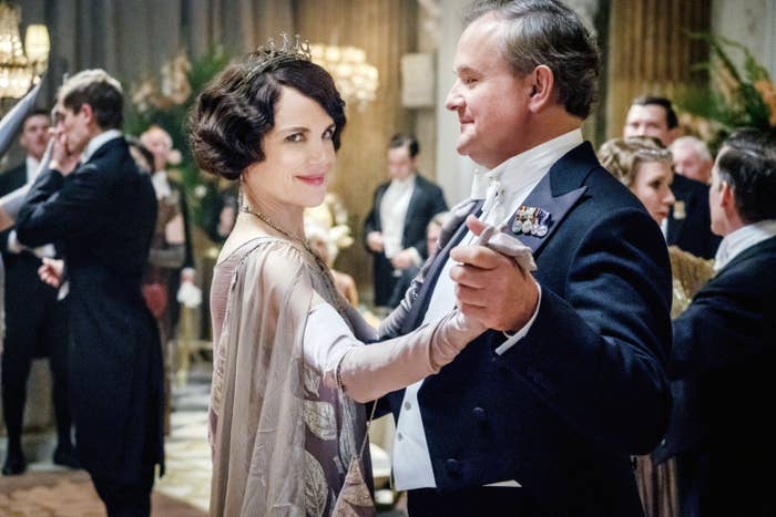 Robert Crawley and his wife, Cora, dance around a grand ballroom
