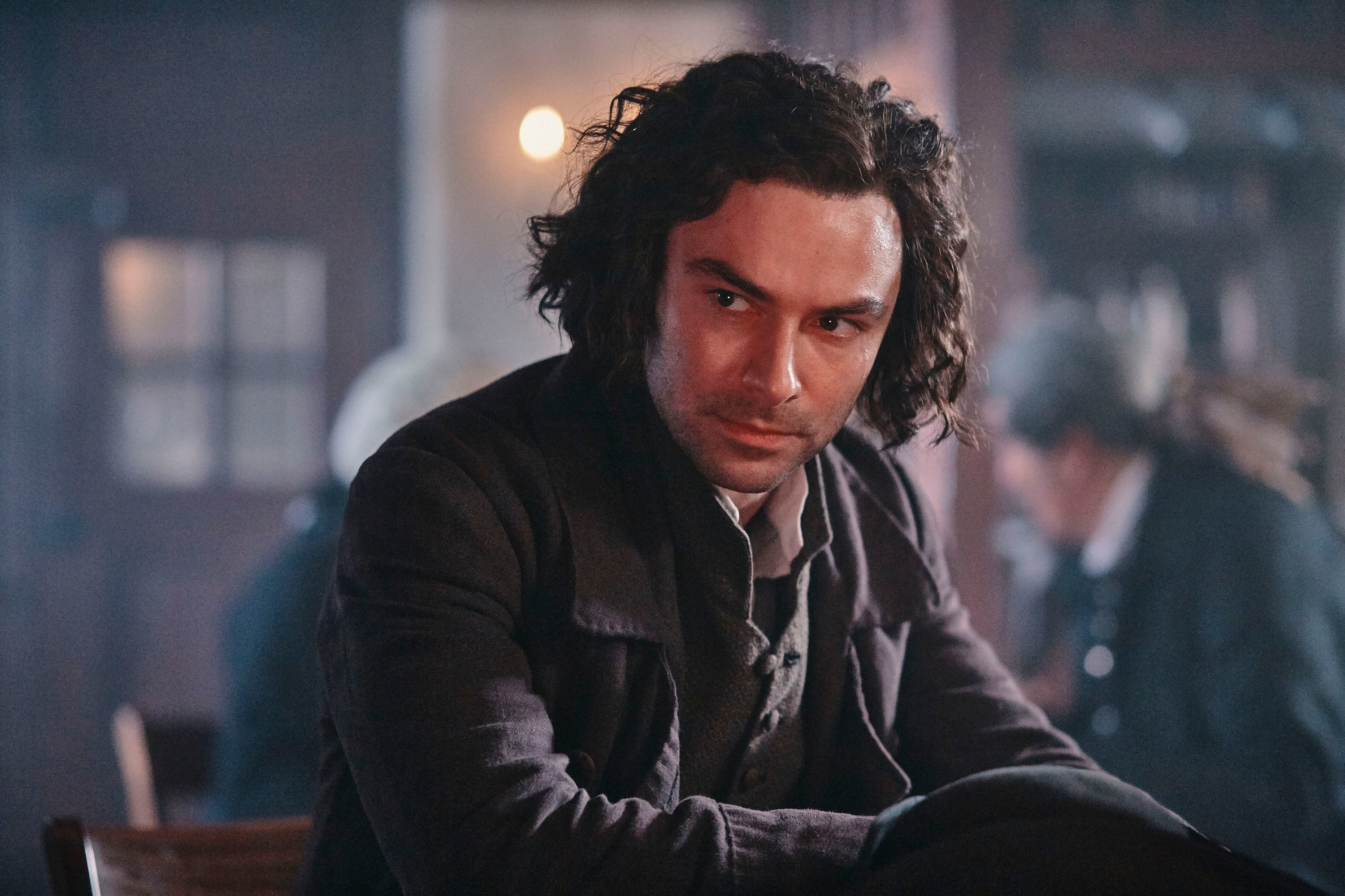 A close up of Captain Ross Vennor Poldark as he sits at a tavern table