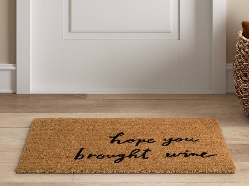 Brown doormat with text