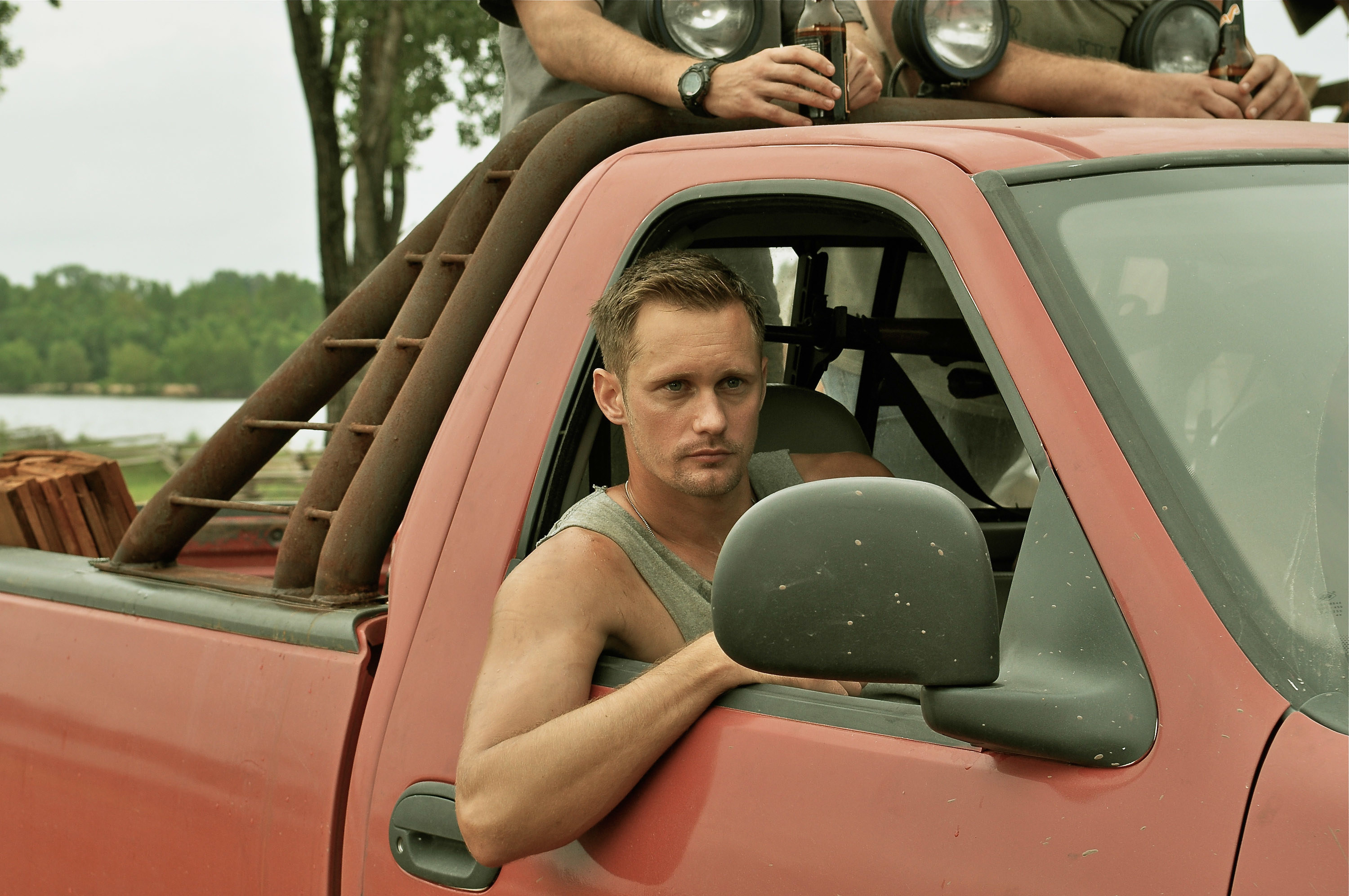 Alexander Skarsgard leans out a truck&#x27;s window