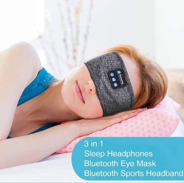 Model sleeping on pillow with the headband over eyes. caption bubble reads &quot;3 in 1, sleep headphones, bluetooth eye mask and bluetooth sports headband
