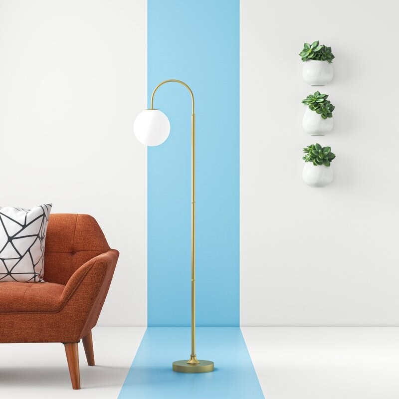 The floor lamp pictured in the gold color