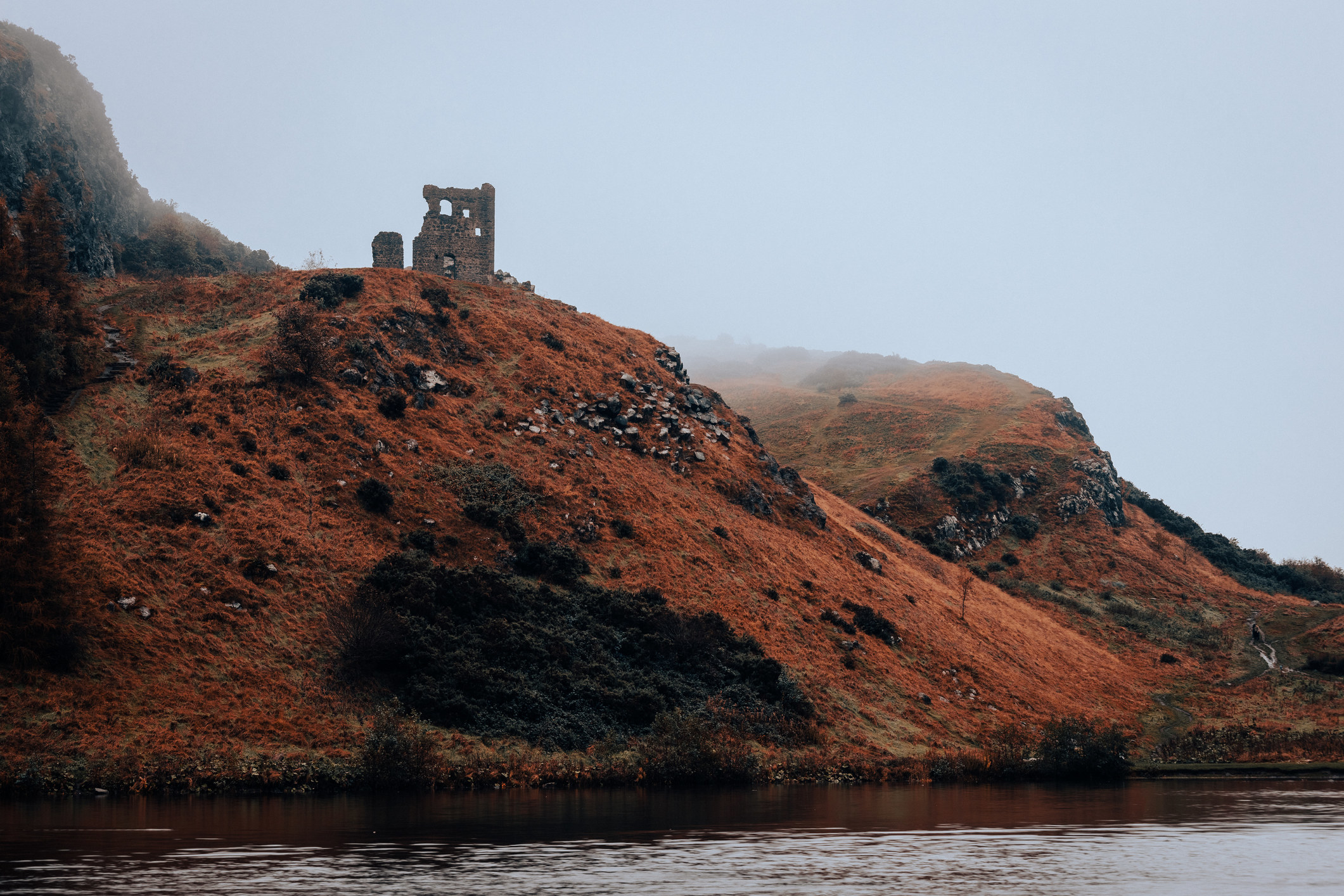 A worn, abandoned castle on Arthur&#x27;s Seat, a dead volcano, in Edinburgh, Scotland