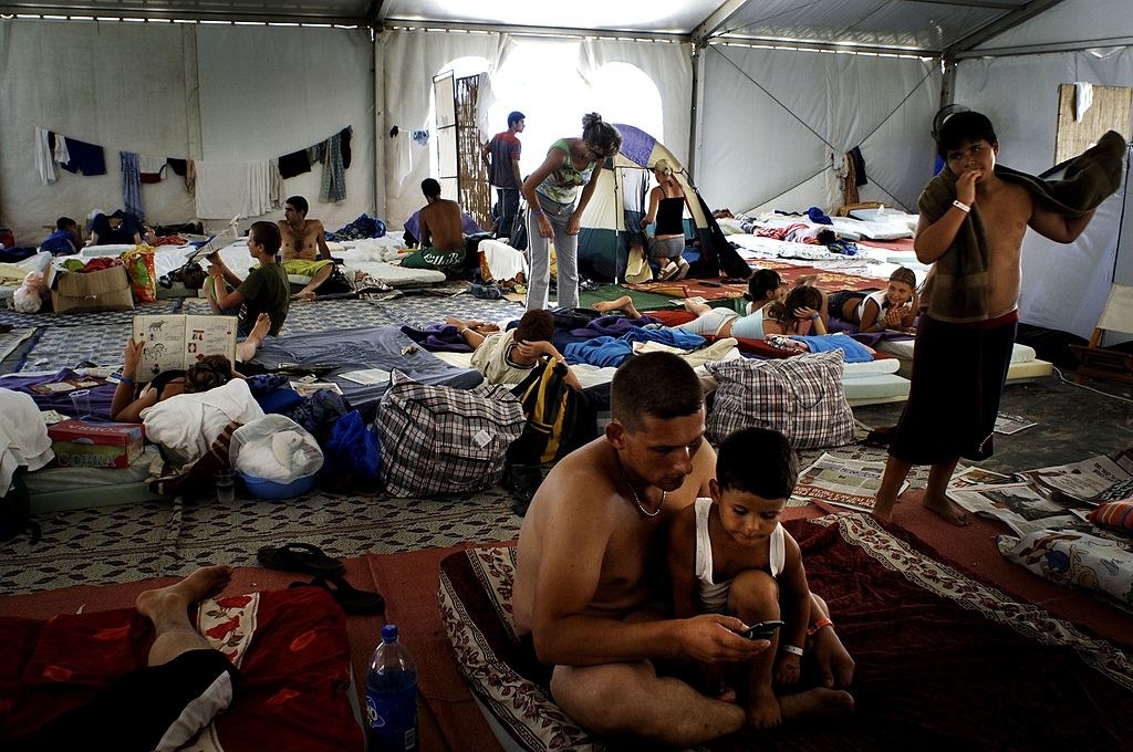 Israeli evacuees sleep on mattress on the floor of the tent shared with scores of other people July 28, 2006 on Nitzanim Beach in southern Israel